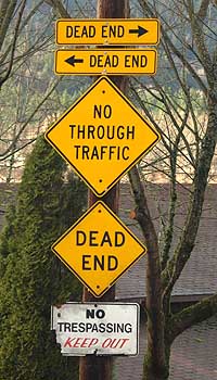 Even the official signposts in Warrendale bear blunt warnings for visitors