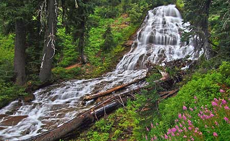 Lovely Umbrella Falls splashes just a few hundred feet from the Meadows resort. Sadly, the falls is littered with parking lot debris blown by snow plows.