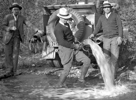 Alva Day (left) overseeing the release of hatchery fry in 1933 (source: Hood River History)