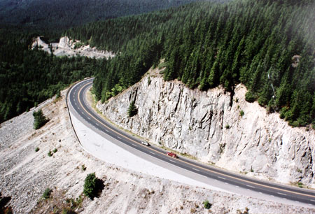 The towering road cut at the Highway 26 “Map Curve” will get taller and much longer under the ODOT safety proposal (photo: ODOT)