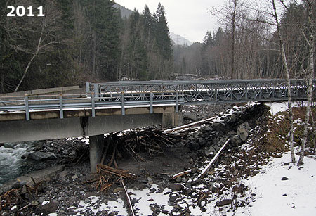 The Old Maid Flat Bridge over the Sandy River was repaired with a temporary approach ramp (on the right in this photo) where the bridge approach had washed out by raging water