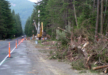 "Widening for bicycle lanes" sounds easy, but the devil is in the details when the road travels through public forest lands