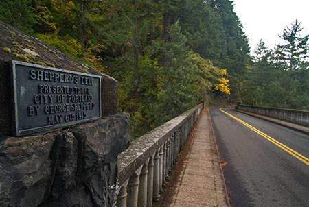 Shepperd's Dell bridge and the modest memorial plaque