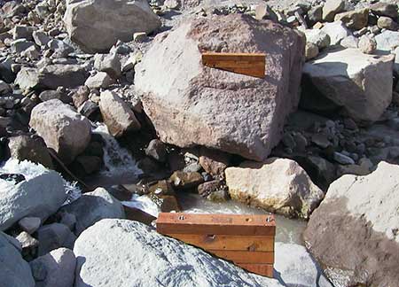 These seasonable bridge footings were bolted to a pair of huge boulders that were swept away in the 2006 washout 