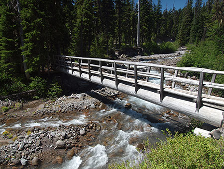 Sadly, this fine bridge over Clark Creek is among the few surviving on Mount Hood, and the only surviving permanent crossing on a glacial stream.