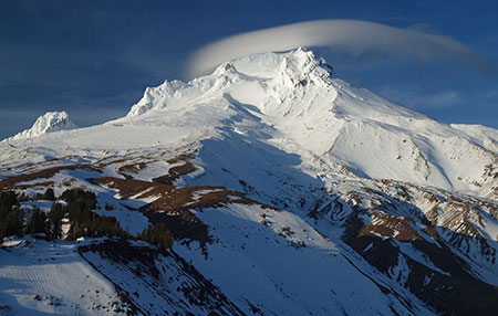Lenticular cloud forming over The Mountain