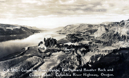   1920s view east from near Chanticleer Point showing Rooster Rock, the salmon cannery, original railroad, Echo Bay and Crown Point.