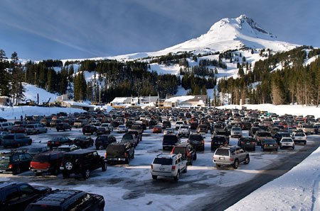 The price to park at Mount Hood’s snow park lots is the same any day of the week, overloading parking areas and the Loop Highway